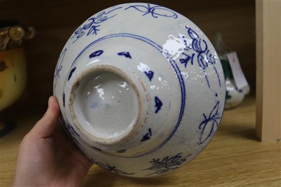 Two Chinese teapots, a bowl and an ornament